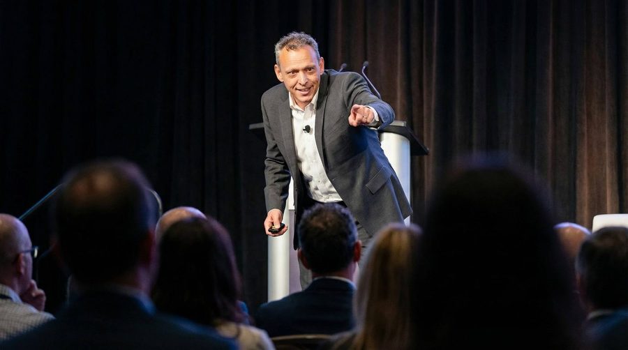 Patrick D. Lynch engaging with a small group